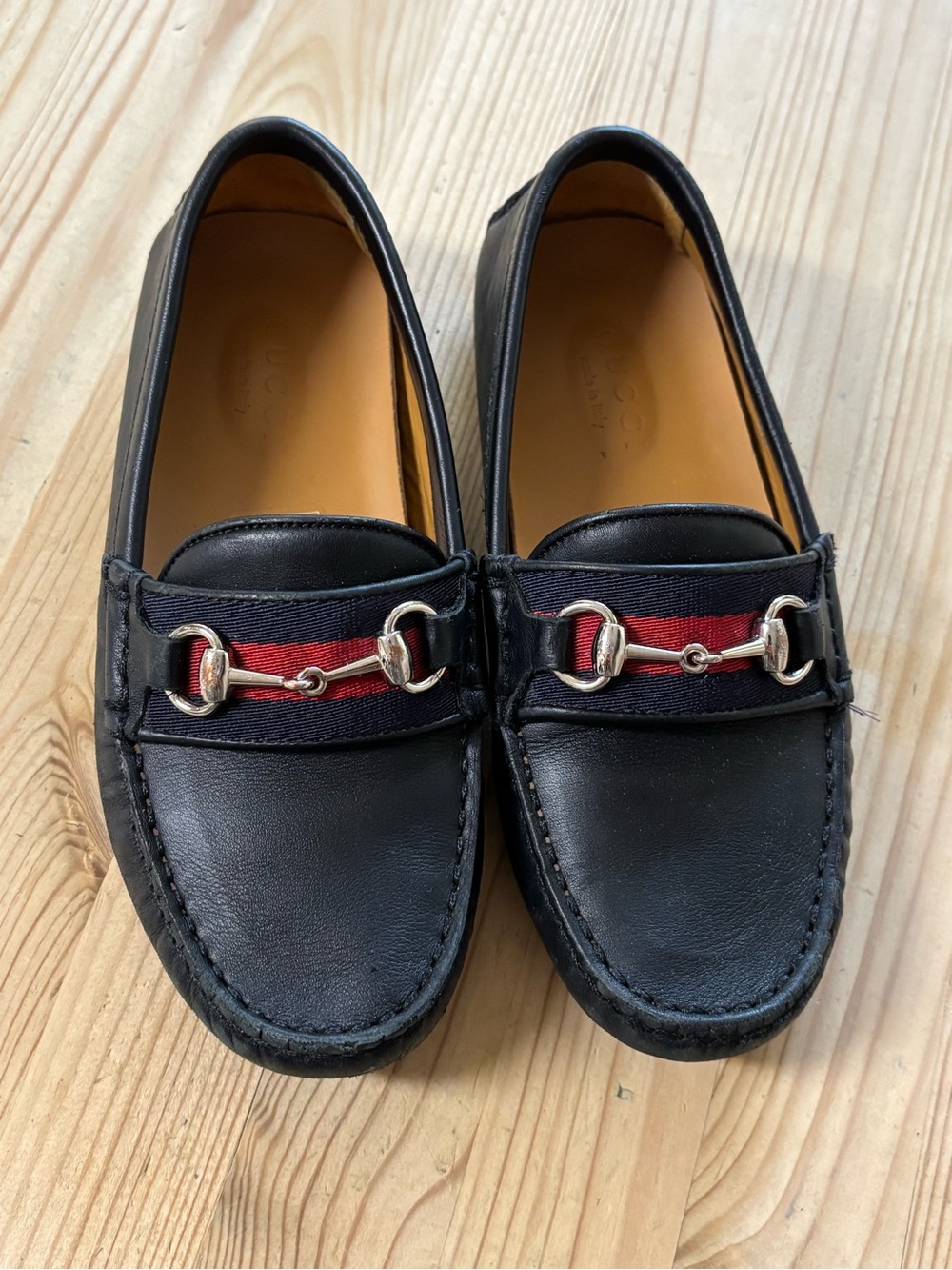 Gucci Leather Driver Loafers with Red and Navy Web and horsebit.